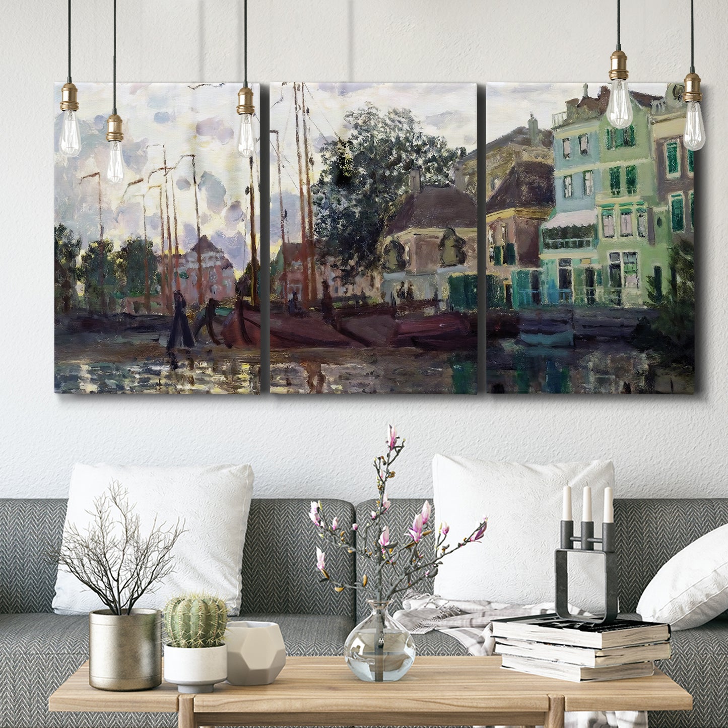 Three-panel canvas wall art featuring riverside town dike at evening, displayed in a modern living room above seating.