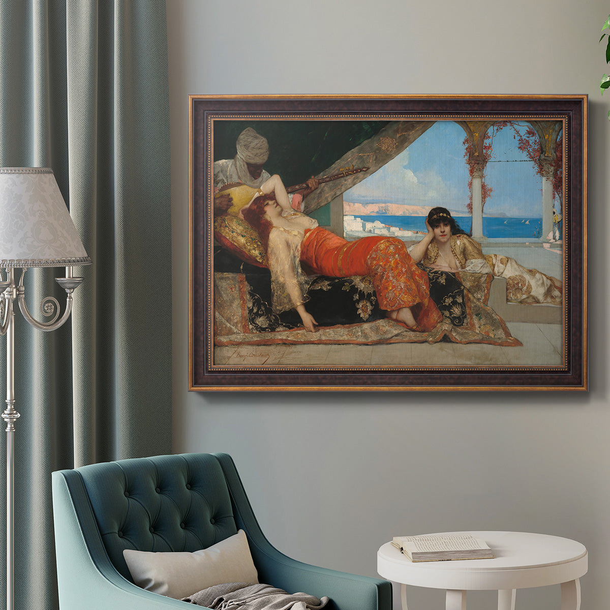 Orientalist portrait scene by Jean-Joseph Benjamin-Constant in an ornate bronzed mahogany wood frame displayed in a bright interior setting.