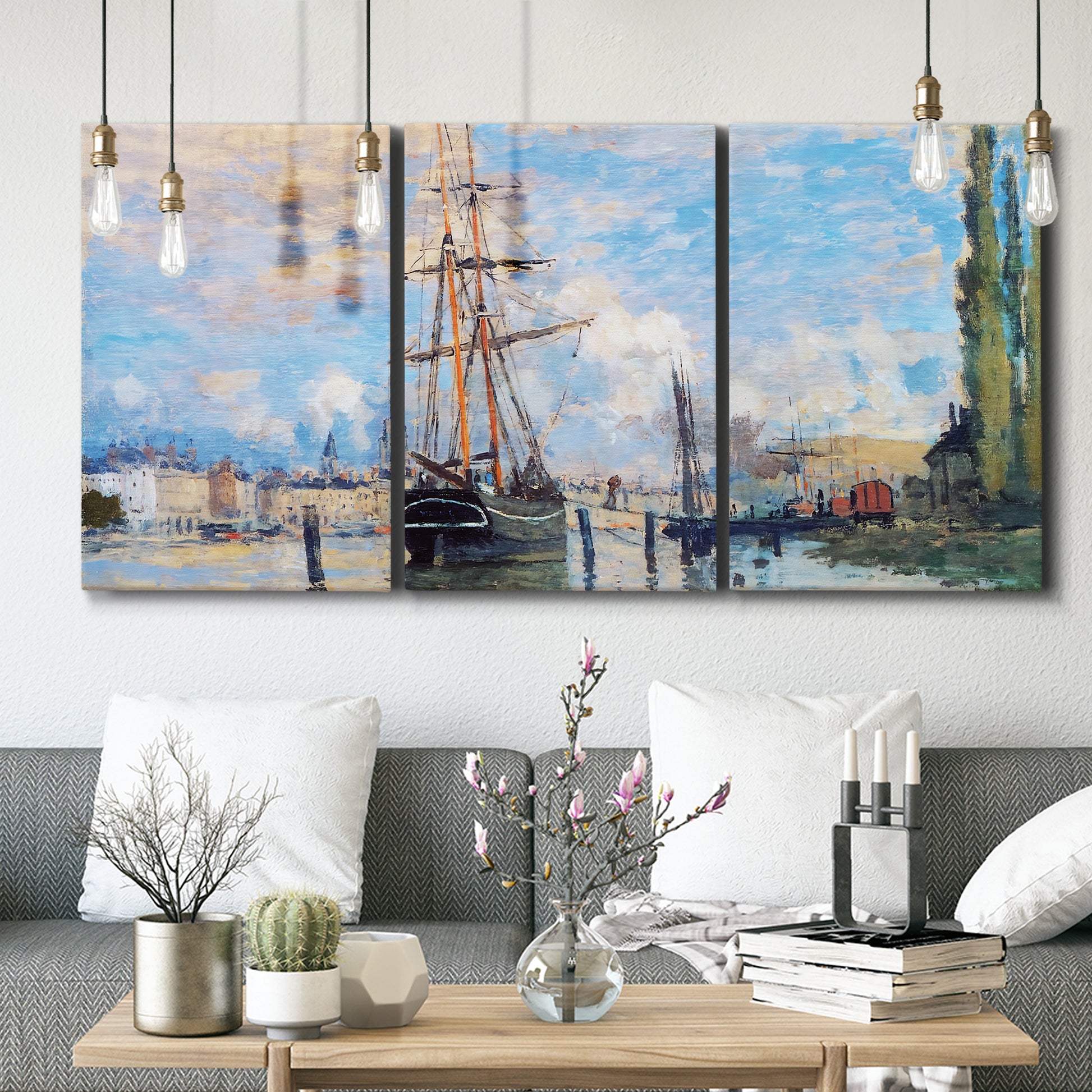 Three-panel canvas wall art featuring busy river port scene, displayed in a modern living room above seating.