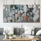 Three-panel canvas wall art featuring layered canyon inspired abstract forms, displayed in a modern living room above seating.