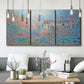 Three-panel canvas wall art featuring sunlit valley landscape, displayed in a modern living room above seating.