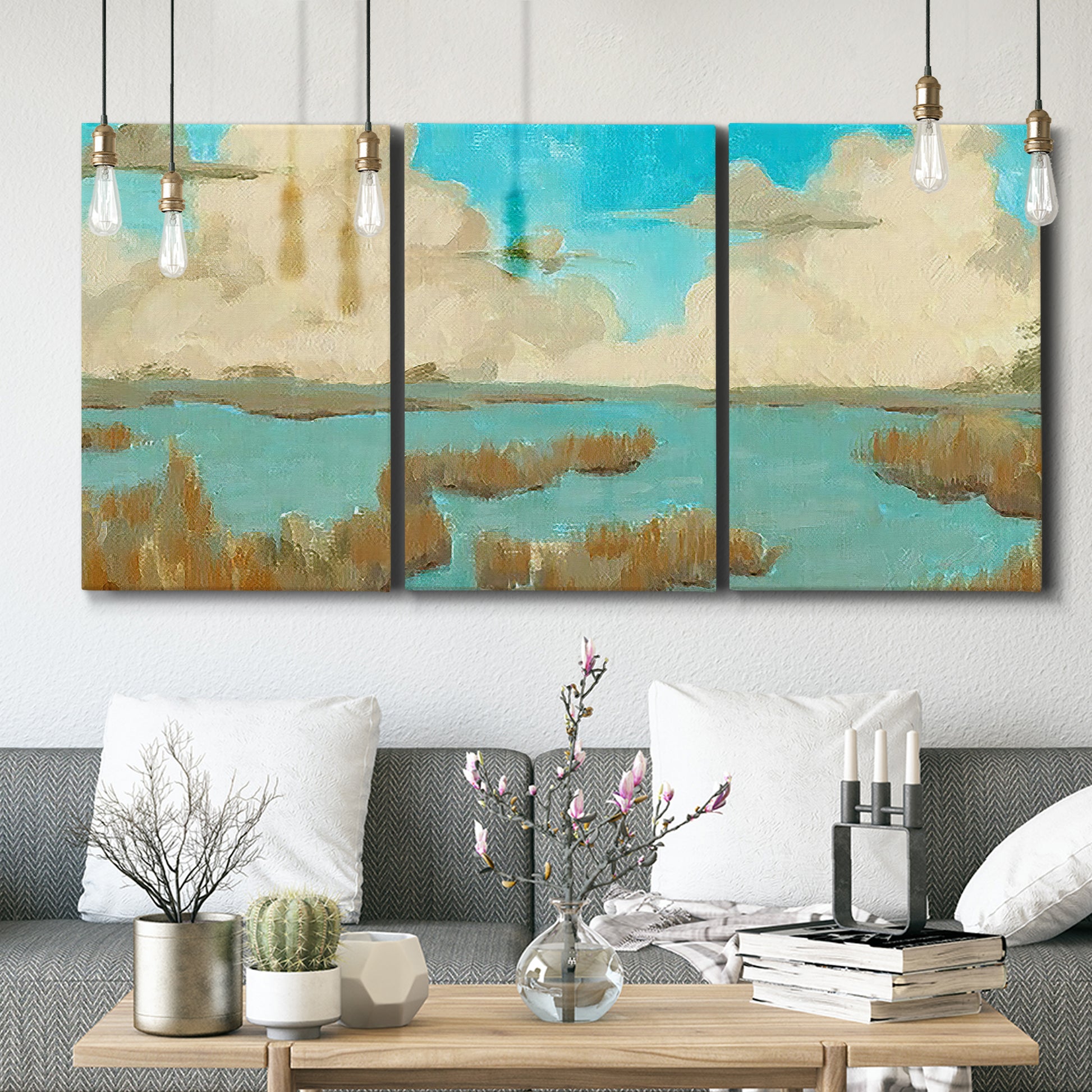 Three-panel canvas wall art featuring abstract pond scene with reflections, displayed in a modern living room above seating.