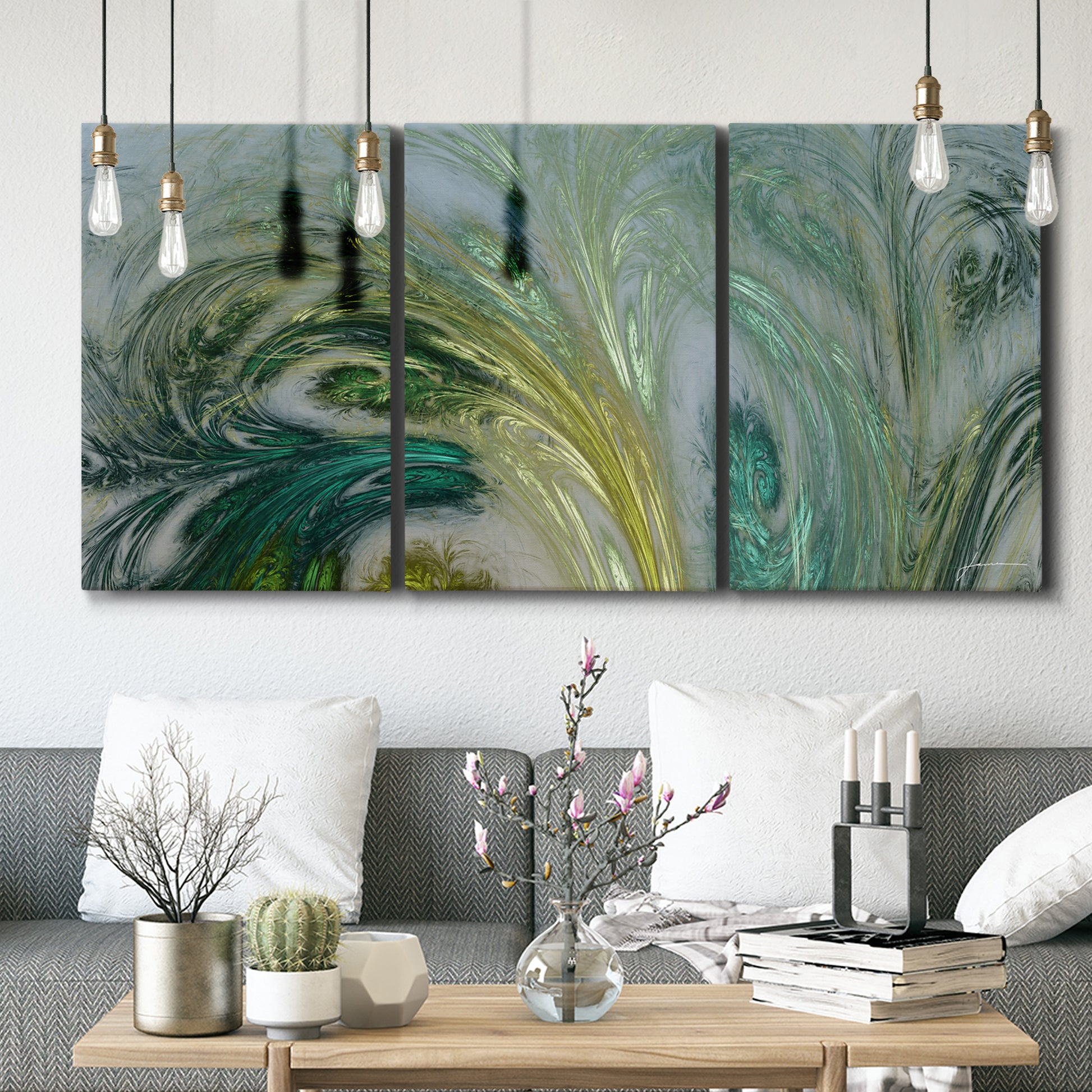 Three-panel canvas wall art featuring layered modern abstract landscape, displayed in a modern living room above seating.