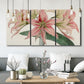 Three-panel canvas wall art featuring vintage styled amaryllis floral study, displayed in a modern living room above seating.
