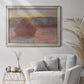 Impressionist haystack sunset scene in winter by Claude Monet in an ornate champagne frame displayed in a bright interior setting.