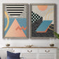 Set of two gray barnwood framed canvas prints depicting a coordinated art pair of bold geometric Memphis-style patterns rendered as retro graphic abstracts above a dining room sideboard.