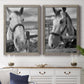Set of two gray barnwood framed canvas prints depicting a coordinated art pair of black-and-white close-up portraits of horses at fences rendered as modern equestrian photography above a dining room sideboard.