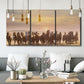 Three-panel canvas wall art featuring running horses captured in motion, displayed in a modern living room above seating.