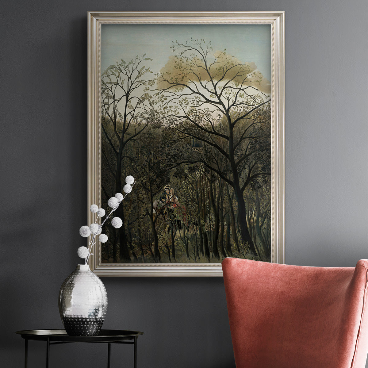Dreamlike forest landscape scene by Henri Rousseau in an ornate champagne frame displayed in a dark-toned interior setting.