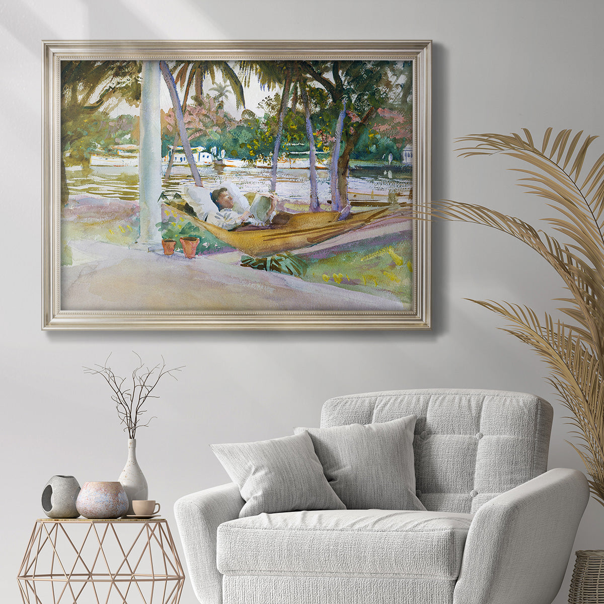Impressionist leisure portrait scene by John Singer Sargent in an ornate champagne frame displayed in a bright interior setting.