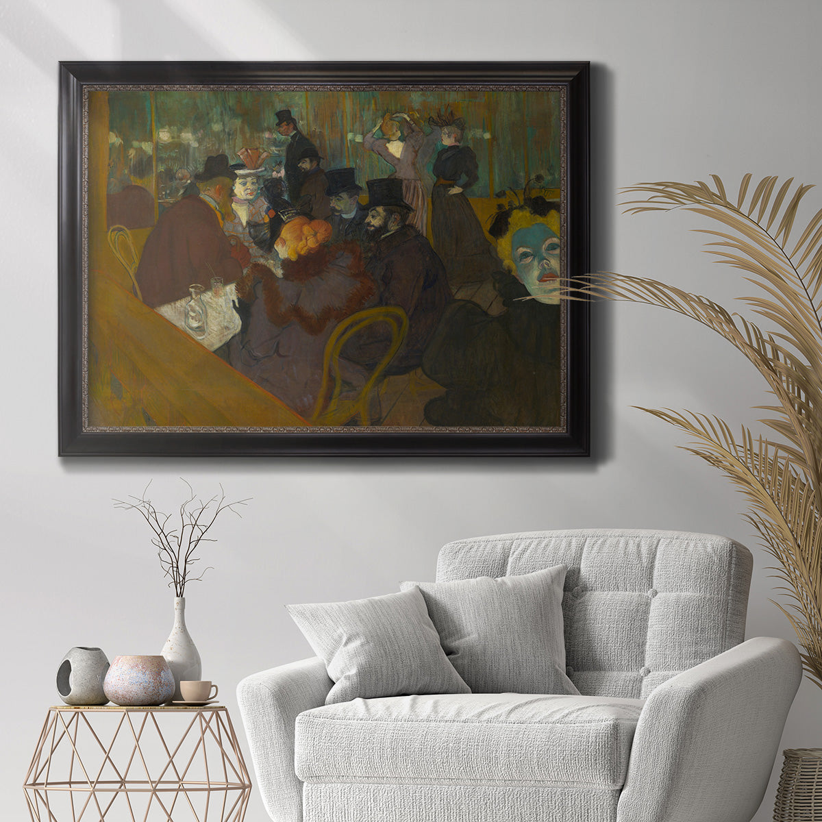 Impressionist cabaret interior scene by Henri de Toulouse-Lautrec in an ornate black frame with gilded inner detail displayed in a bright interior setting.
