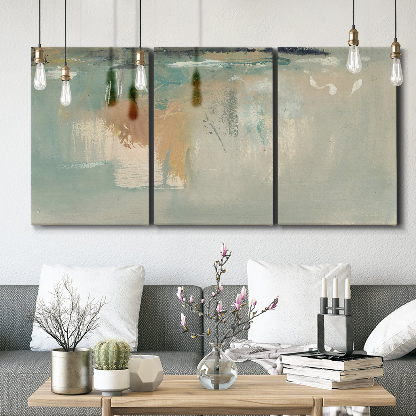 Three-panel canvas wall art featuring minimalist abstract emotional fields, displayed in a modern living room above seating.