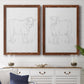 Set of two maple barnwood framed canvas prints depicting a coordinated art pair of simple contour drawings of standing cows rendered as minimalist livestock sketches above a dining room sideboard.