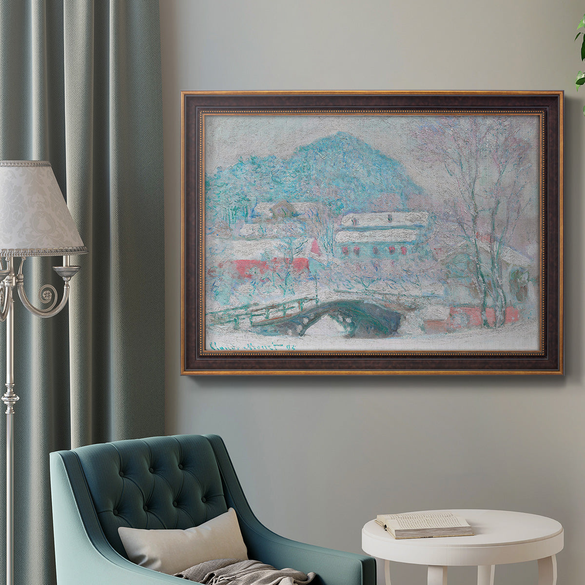 Impressionist coastal village landscape in Norway by Claude Monet in an ornate bronzed mahogany wood frame displayed in a bright interior setting.