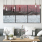 Three-panel canvas wall art featuring winter sunset snowfall landscape, displayed in a modern living room above seating.