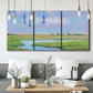 Three-panel canvas wall art featuring summer marshland with tall grasses, displayed in a modern living room above seating.