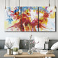 Three-panel canvas wall art featuring bright abstract summer palette, displayed in a modern living room above seating.