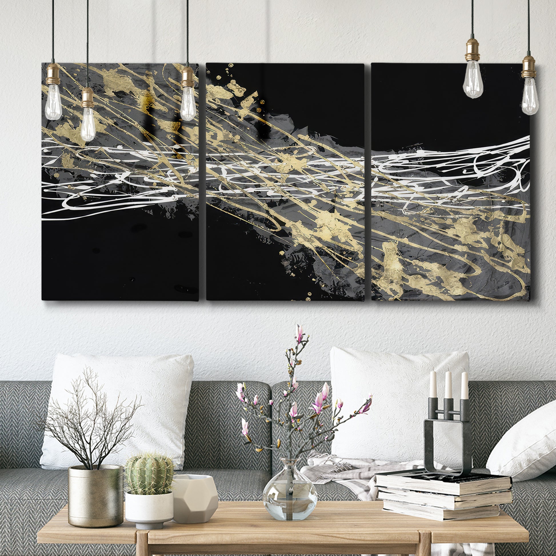 Three-panel canvas wall art featuring dark modern abstract wind patterns, displayed in a modern living room above seating.