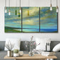 Three-panel canvas wall art featuring coastal shoreline with soft waves, displayed in a modern living room above seating.