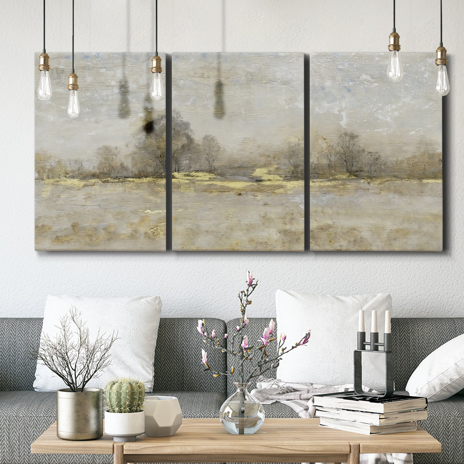 Three-panel canvas wall art featuring late season rural harvest fields, displayed in a modern living room above seating.