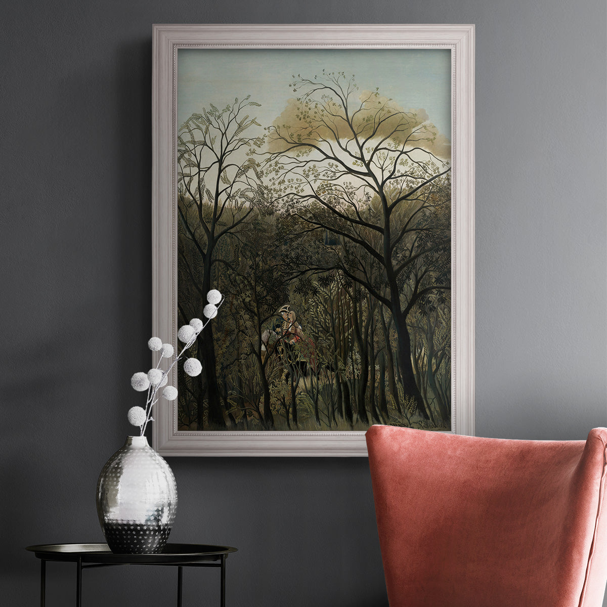 Dreamlike forest landscape scene by Henri Rousseau in an ornate weathered white frame displayed in a dark-toned interior setting.