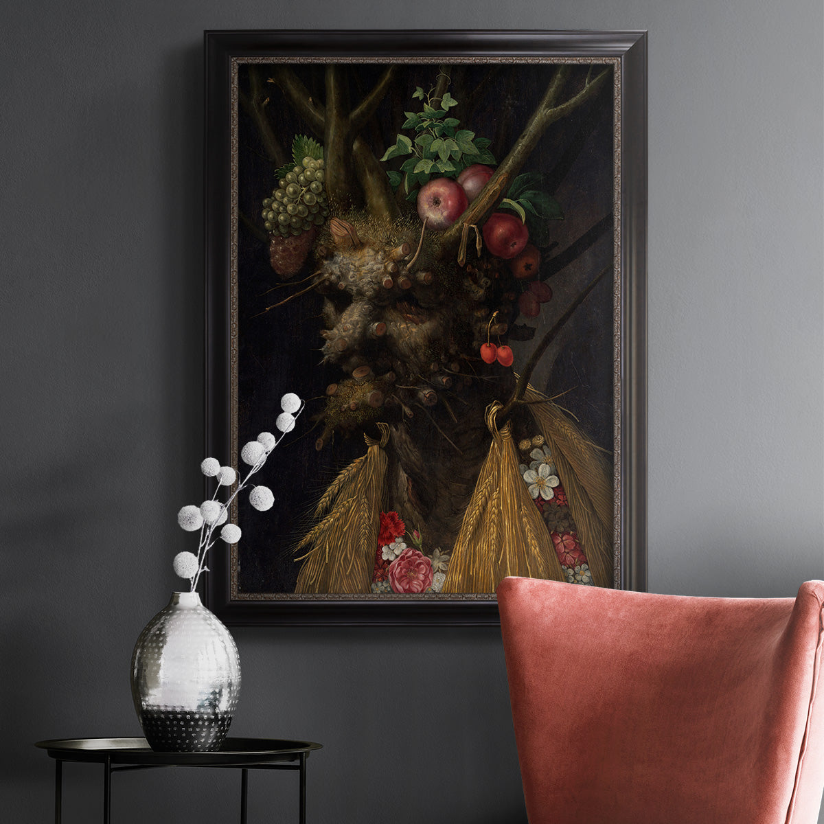 Surreal allegorical portrait representing the four seasons by Giuseppe Arcimboldo in an ornate black frame with gilded inner detail displayed in a dark-toned interior setting.
