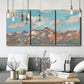 Three-panel canvas wall art featuring soft pastel western hills landscape, displayed in a modern living room above seating.