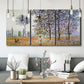 Three-panel canvas wall art featuring three poplar trees beside water, displayed in a modern living room above seating.