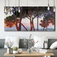 Three-panel canvas wall art featuring sunlit pines along mediterranean coast, displayed in a modern living room above seating.