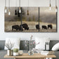 Three-panel canvas wall art featuring cattle grazing along ridge line, displayed in a modern living room above seating.
