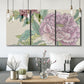 Three-panel canvas wall art featuring soft pink peony blossoms, displayed in a modern living room above seating.