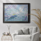 Impressionist industrial harbor scene by Paul Signac in an ornate black frame with gilded inner detail displayed in a bright interior setting.