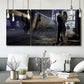 Three-panel canvas wall art featuring couple kissing at train station, displayed in a modern living room above seating.