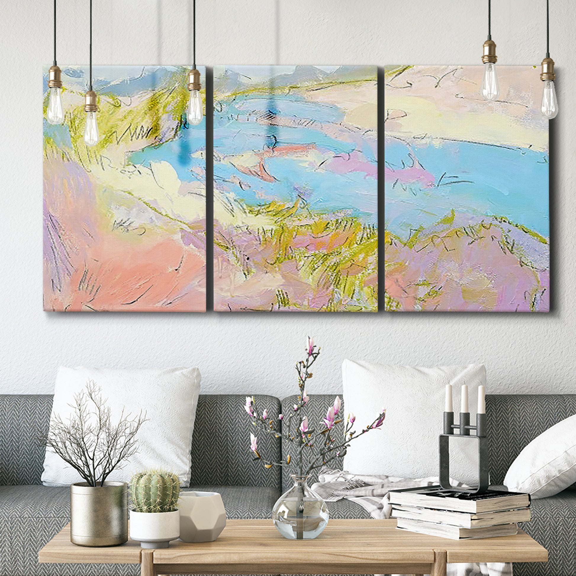 Three-panel canvas wall art featuring geometric mid century abstract blocks, displayed in a modern living room above seating.