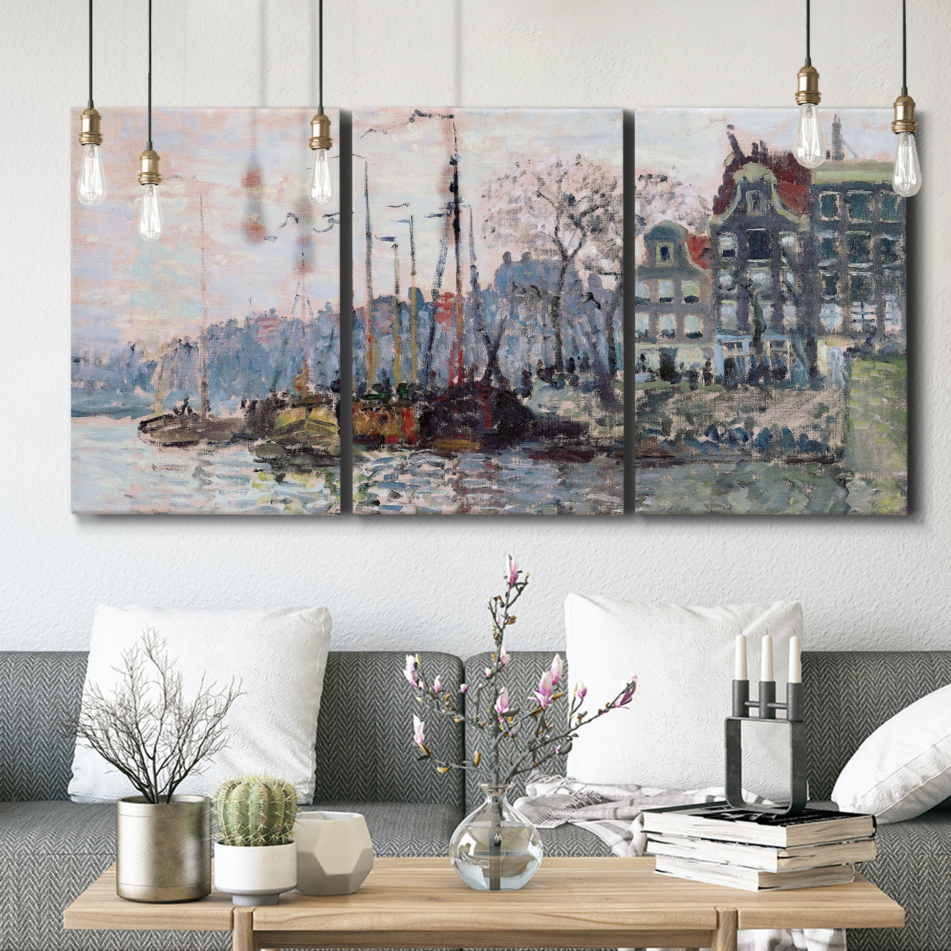Three-panel canvas wall art featuring historic canal view with boats, displayed in a modern living room above seating.