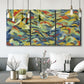 Three-panel canvas wall art featuring colorful abstract river like motion, displayed in a modern living room above seating.