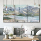 Three-panel canvas wall art featuring pastel mountain landscape view, displayed in a modern living room above seating.