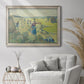 Impressionist rural hay harvest landscape by Camille Pissarro in an ornate champagne frame displayed in a bright interior setting.