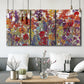 Three-panel canvas wall art featuring colorful floral arrangement, displayed in a modern living room above seating.