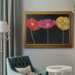 Contemporary poppy flower artwork in an ornate traditional gold frame displayed in a neutral interior setting.