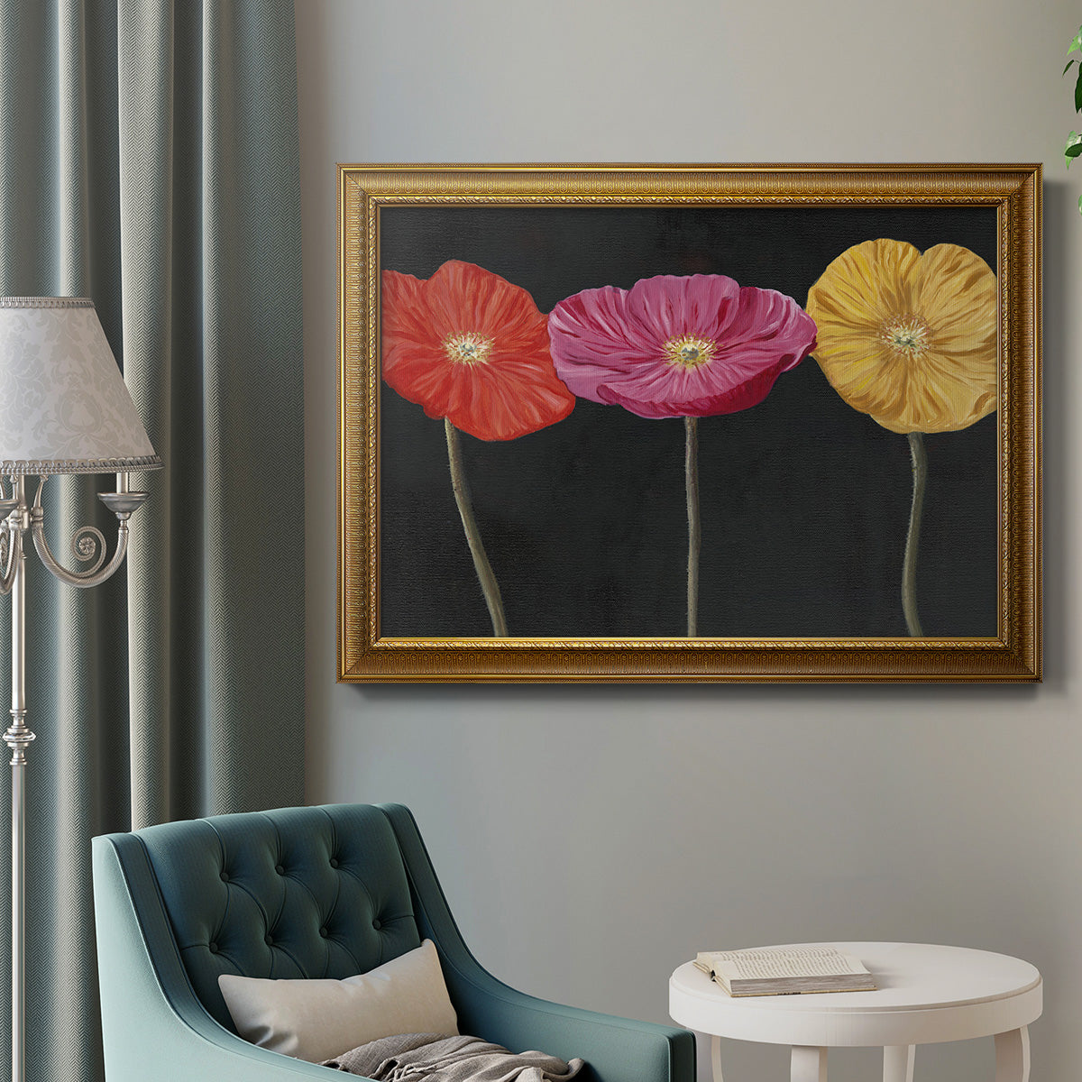 Contemporary poppy flower artwork in an ornate traditional gold frame displayed in a neutral interior setting.