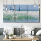 Three-panel canvas wall art featuring coastal waves breaking ashore, displayed in a modern living room above seating.