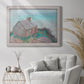 Impressionist coastal building landscape by Claude Monet in an ornate weathered white frame displayed in a bright interior setting.