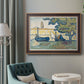 Impressionist harbor scene at Saint-Tropez by Paul Signac in an ornate bronzed mahogany wood frame displayed in a bright interior setting.