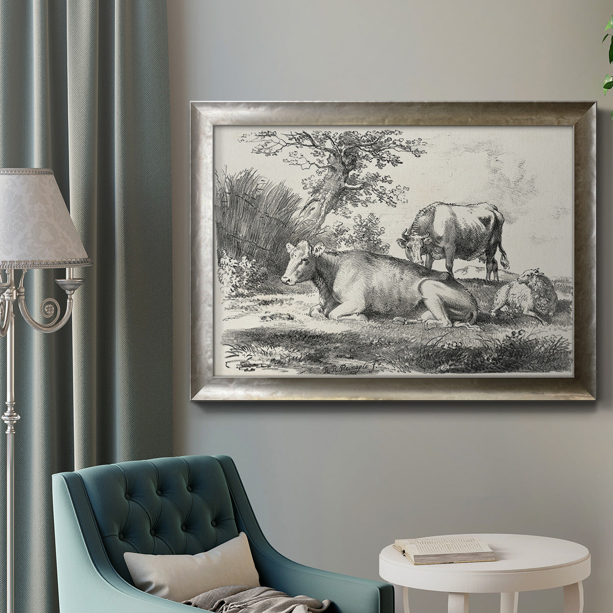 Classical pastoral landscape artwork by Nicolas Berchem in an ornate mottled silver frame displayed in a neutral interior setting.