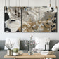 Three-panel canvas wall art featuring pale abstract mask like forms, displayed in a modern living room above seating.