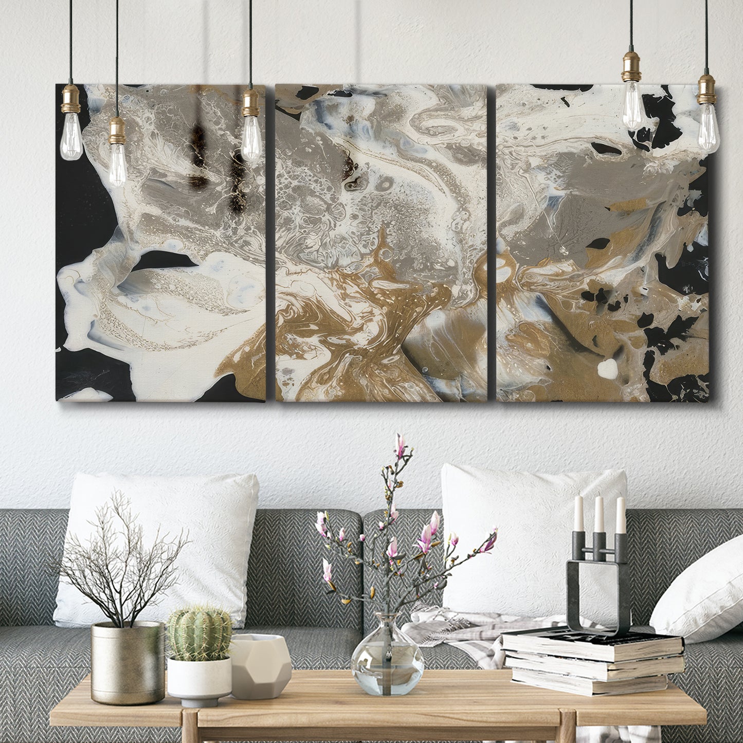 Three-panel canvas wall art featuring pale abstract mask like forms, displayed in a modern living room above seating.