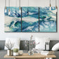 Three-panel canvas wall art featuring layered abstract marble textures, displayed in a modern living room above seating.