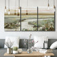 Three-panel canvas wall art featuring pastoral fields under soft sunrise, displayed in a modern living room above seating.