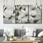 Three-panel canvas wall art featuring soft southern floral charm, displayed in a modern living room above seating.
